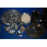 A quantity of silver plate to include a Candelabra, sauce boat, two galleried trays, wine coasters,