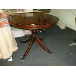 A circular Mahogany Table with 2" border strings,