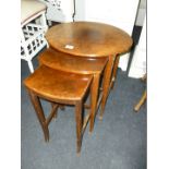 A nest of three Burr wood Tables.