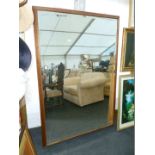 A large bevel plate Mahogany framed Wall Mirror, 68 1/2'' long x 48'' wide approx.