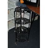 A four tier cast iron Saucepan rack