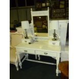 A white painted Dressing Table with fretwork panels, 42" wide x 60" high.