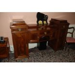 A large Edwardian flame Mahogany Buffet/Sideboard, bow fronted with cupboard to either side,