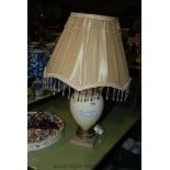 A cream table lamp