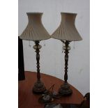 A pair of decorative Table Lamps with three glass droppers to each and cream silk shades,