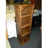 A small narrow, Oak four shelf Bookcase. 15 1/2" wide x 45 1/2" high.