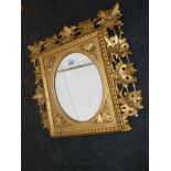 A small gilt framed Mirror.