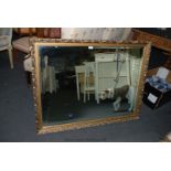 A large modern bevel plated gilt framed Mirror having decorative seed head frame,