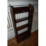 A Mahogany Bookshelves with fretwork sides and four drawers under,