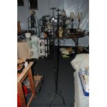 A tall wrought iron five branch Candle stand