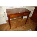 A square legged Mahogany fold over Tea Table.