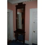 A Victorian mixed wood Pier Mirror with shelf and two turned supports, and cross banded top,