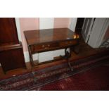 A Mahogany Sofa Table, 34'' extending to 57'' with leaves up,