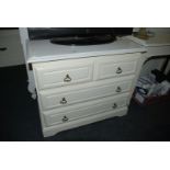 A modern white Chest of two short over two long Drawers, 31 3/4" x 17".