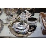 A circular galleried Tray with three plated Teapots and Sucrier