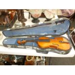 A small Chinese boxwood Violin in case,
