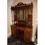 An elegant mirror backed Sideboard with marquetry panels on opposing cupboard and drawers,