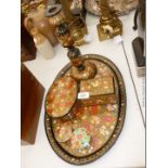 A Kaskmiri papier mache Tray together with a lidded Box and matching Candlesticks.