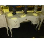 A white painted French style Kneehole Dressing Table, 49 1/4" wide x 29 1/4" high.