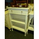 A white painted Bookshelf with single drawer, 25 1/2" wide.