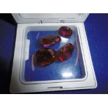 BOXED COLLECTION OF FOUR BURMA RUBIES