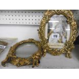 TWO GILT PICTURE FRAMES WITH CHERUBS,