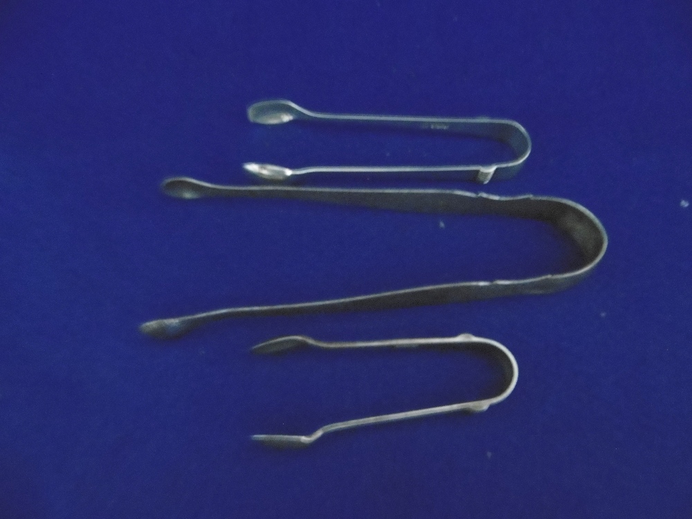 THREE PAIRS OF HM SILVER SUGAR TONGS (ONE C1804),