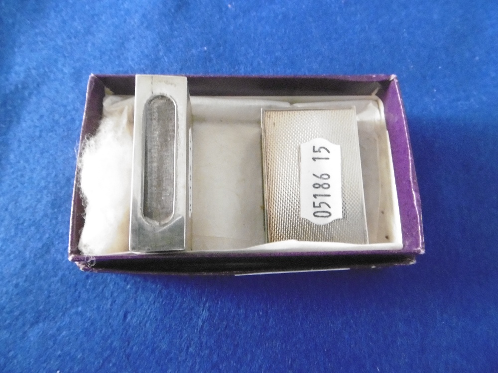 PAIR OF HM SILVER MATCH BOX CASES