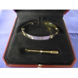 18ct GOLD, CARTIER BANGLE,