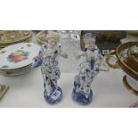 PAIR OF 19TH CENTURY HAND PAINTED BISQUE FIGURES IN THE STYLE OF MEISSEN