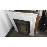 A VICTORIAN IRON FIREPLACE, 65.