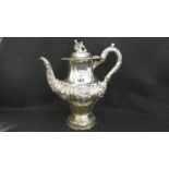 A FINE QUALITY REGENCY PERIOD ORNATE SILVER COFFEE POT SURMOUNTED WITH A FIGURE, SOME DAMAGE,