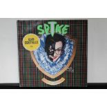 ELVIS COSTELLO - a signed copy of Elvis Costello's album Spike (WX 238).