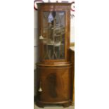 CORNER CABINET - a glass fronted mahogan