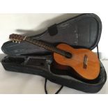 GUITAR - a Yamaha CG-150SA classical acoustic guitar complete with Pod carry case.