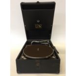 GRAMOPHONE - HMV Model 101 portable gramophone in black dating from circa 1926 to 1931.
