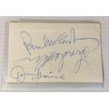 WINGS & PAUL MCCARTNEY - a piece of card signed by all of the band to include Paul McCartney,