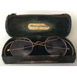 JOHN LENNON GLASSES - pair of gold framed Windsor glasses which were previously owned by John