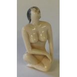 IVORY NETSUKE - beautifully carved and signed Meiji period netsuke of a seated naked woman.