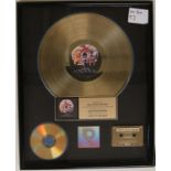 QUEEN - A DAY AT THE RACES RIAA AWARD - Framed gold disc presented to Hollywood Records to