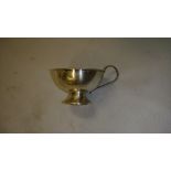 Solid silver wine taster with beaten silver bowl,