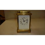 Late 19th early 20th century carriage clock with painted enamel dial and French movement 11 cms x 9