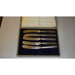 Set of five silver sheathed butter knives in presentation case Sheffield 1918 Yates Brothers