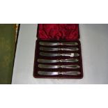 Silver sheathed butter knives in presentation case