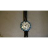 Vintage ladies silver and blue enamel back and rimmed wristwatch with leather strap