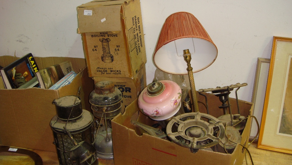 Assorted vintage stoves, Tilley lamp, Valor,