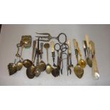 Bag of assorted silver plated flat ware, tea spoons, jam spoons, mother of pearl paperknife etc.