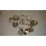 Bag of silver and base metal rings some set with hardstones, maracasite earrings etc.