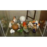 Shelf of decorative china including vintage gnome ornaments