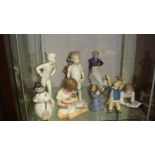 Shelf of Royal Copenhagen figure : Boy & Girl with Duck Girl with doll,